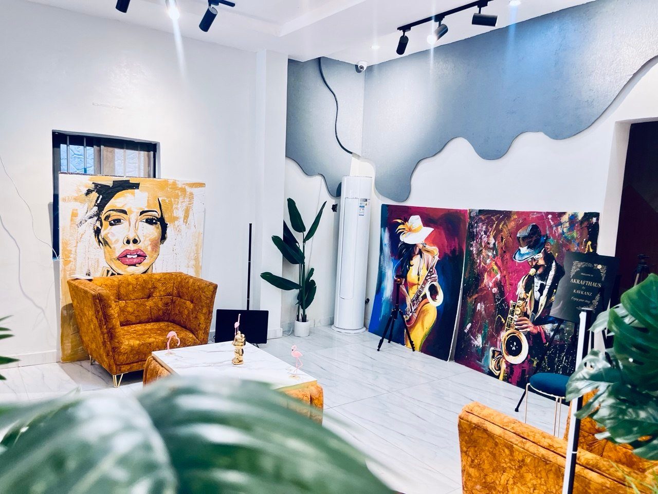 Art and armchairs in an AKRAFTHAUS lounge